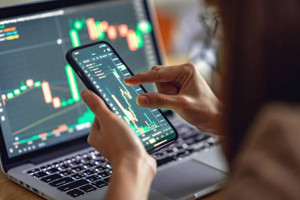 https://media.istockphoto.com/id/1323542329/photo/woman-is-checking-bitcoin-price-chart-on-digital-exchange-on-smartphone-cryptocurrency-future.jpg?b=1&s=612x612&w=0&k=20&c=DeTtr-uAixs-rzxFAOx6FVHrYqn0-at2_ZKcH19EcYs=