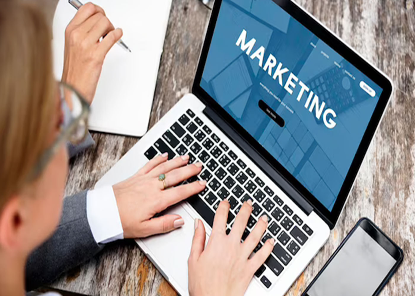 How to find a marketing person for a web design company?
